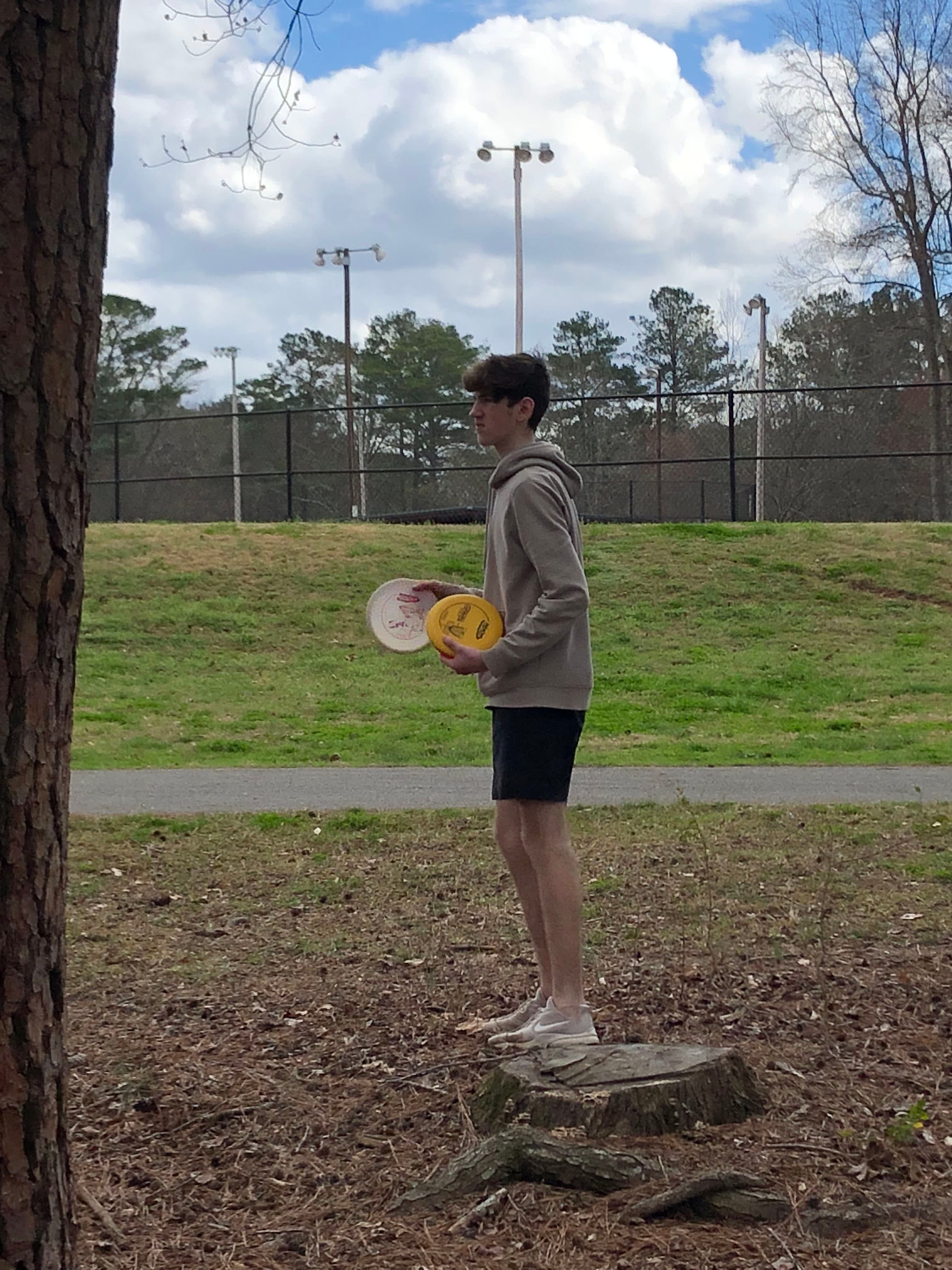 Ryan playing disc golf